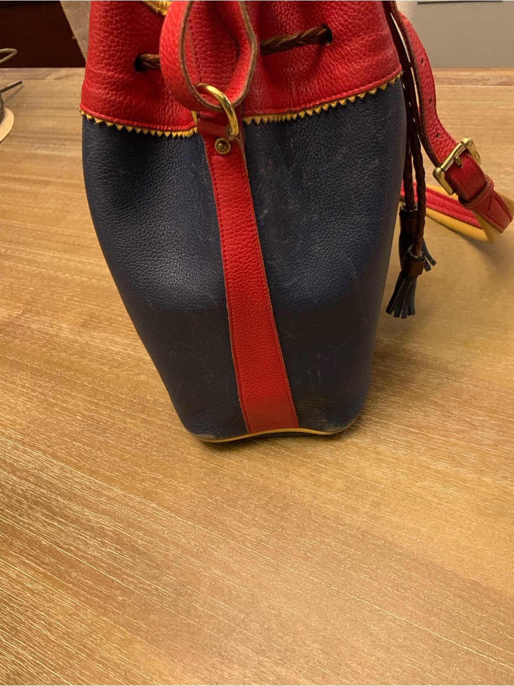 Dooney & Bourke Navy, Red & Yellow Leather Drawstring Bucket Bag - Picture 16 of 16